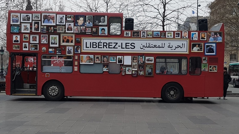 Freedom Bus Touring In Paris And Families Of Regime Detainees Hope It Would Arrive In Damascus