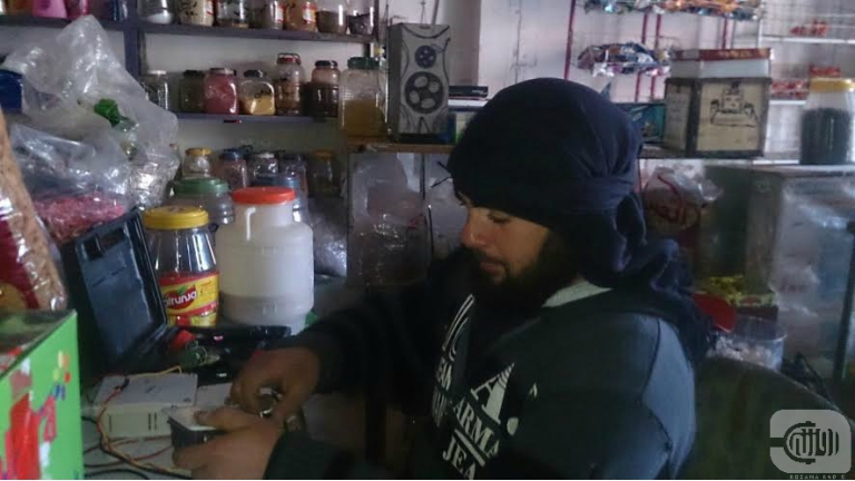 Abu Sedra makes a charger for batteries in Zawya Mount