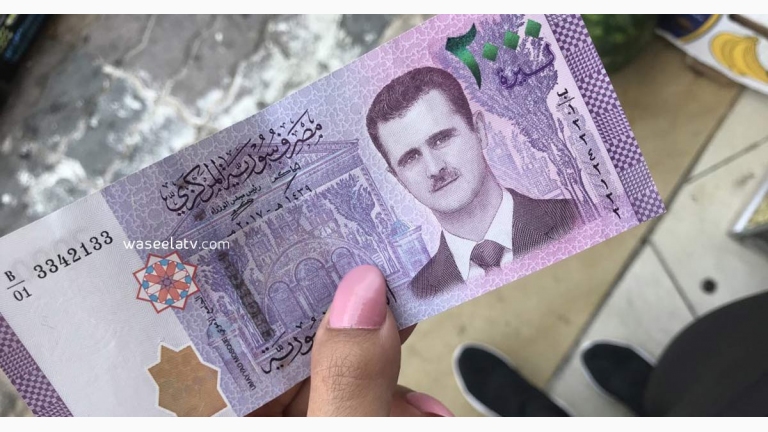  الأسد يصدر مرسوماً بحبس من يتعامل بغير الليرة السورية 7 سنوات 