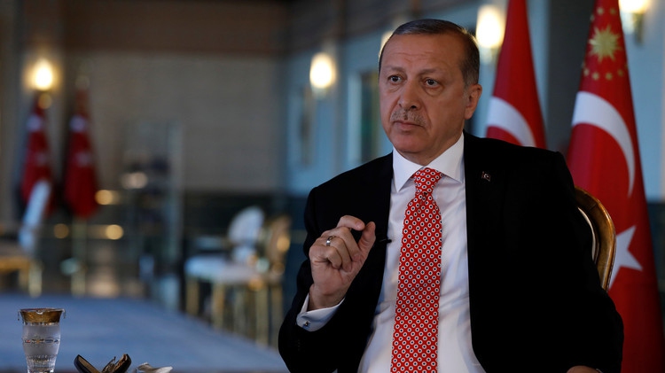 أردوغان: بوتين أبلغني أنه لا يدافع عن الأسد