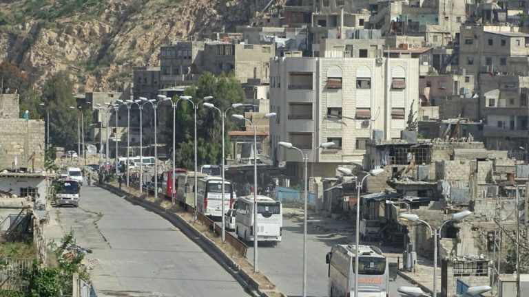 بدء تطبيق اتفاق تهجير في حي برزة بدمشق