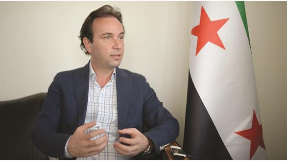 خوجة يصف روسيا بأكبر داعم للأسد وهيئة التنسيق تنتقد تصريحاته 