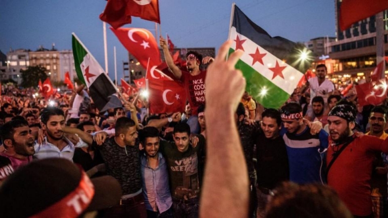 كم عدد السوريين الذين يحق لهم التصويت بالانتخابات التركية؟