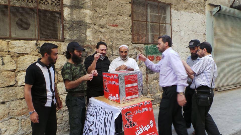 مركز إغاثة يشترط التوقيع على سحب الجنسية من الأسد في حلب 
