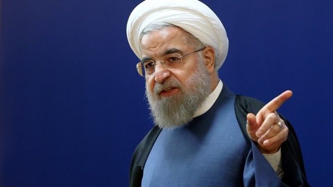 روحاني لماكرون: طهران لا تستبعد الانسحاب العسكري من سوريا