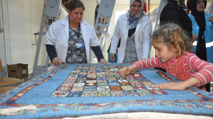 Syrian Hands Weaving Tapestry in Turkey