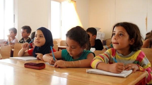 Syrian war spills into classrooms, splitting curriculum over ideology