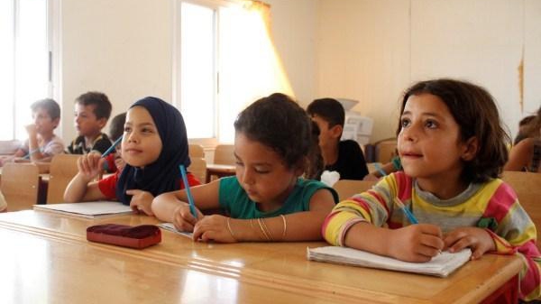 Syrian war spills into classrooms, splitting curriculum over ideology