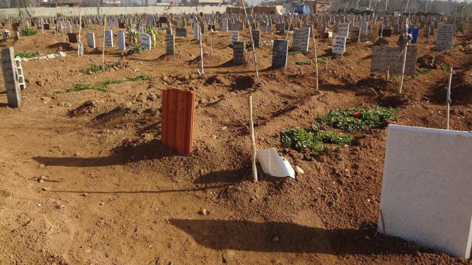 Twenty graves a day, in a city that has grown accustomed to death