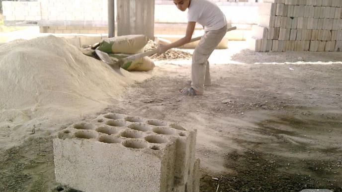 TWO CHILDREN MAKE FRIENDS WITH CEMENT IN WADI AL-NASARA!