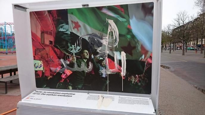 Unknown Persons Distort Images of the Syrian Revolution in Geneva!