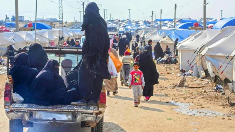 بغداد تعيد 700 عراقي من مخيم 