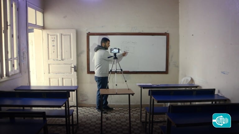 A teacher defeats bombing and displacement