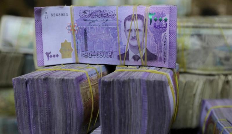 Al-Assad distracts people from hard living conditions by giving them $20 
